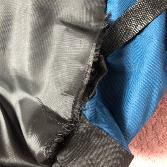 Education First Blue & White Backpack (small rip) - Picture 3 of 4